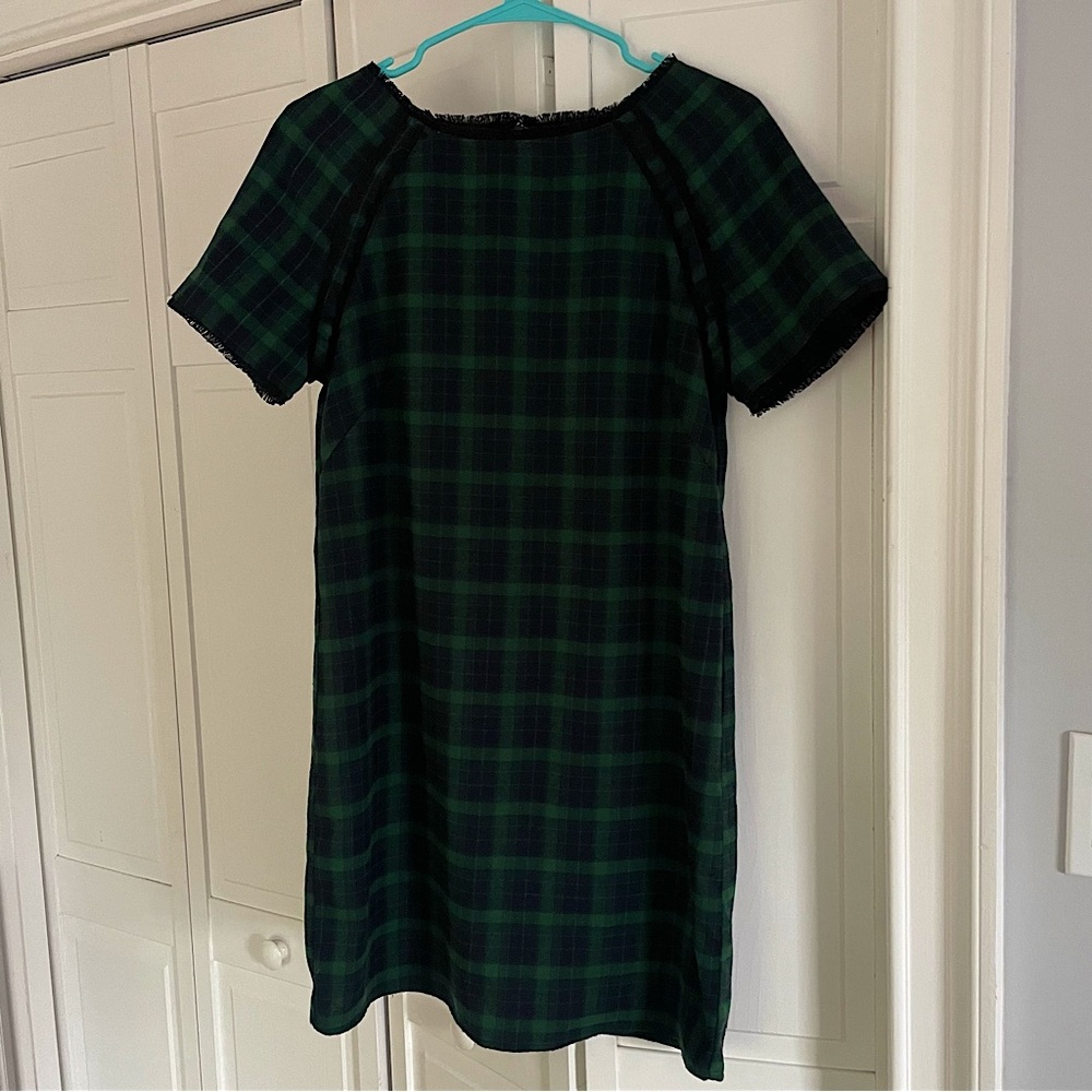 Checkered dress with fringe details. Super flattering and stylish for the office